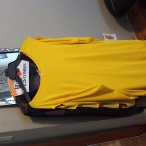 A yellow one size shirt with rhinestones on the sleeves